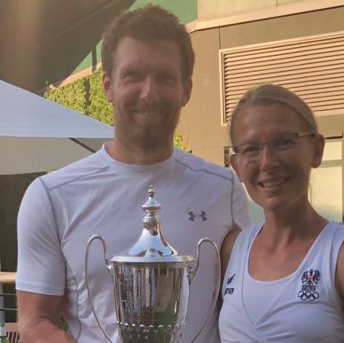 Kirstin Bauer with Alexander Peya holding the trophy